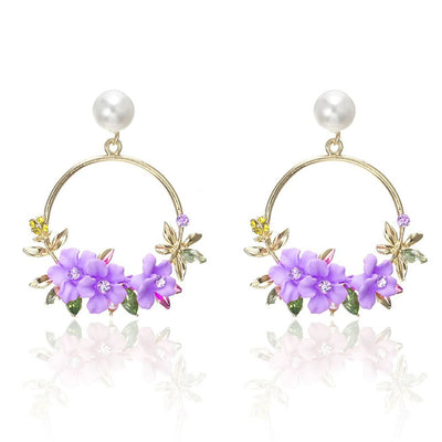 Aretes de Flores y Perlas en Oro